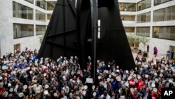 Furloughed government workers affected by the shutdown hold a silent protest against the ongoing partial government shutdown on Capitol Hill in Washington, Wednesday, Jan. 23, 2019. 