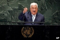 FILE - Palestinian President Mahmoud Abbas addresses the 73rd session of the United Nations General Assembly, at U.N. headquarters, Sept. 27, 2018.