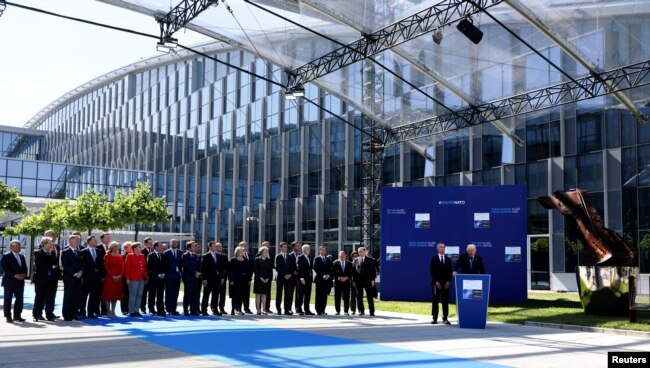 FILE - U.S. President Donald Trump delivers remarks at the start of the NATO summit at their new headquarters in Brussels, Belgium, May 25, 2017.