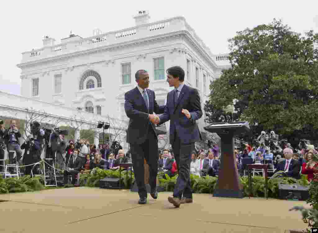 President Barack Obama and Canadian Prime Minister Justin shake hands following the conclusion of their joint news conference, March 10, 2016, in the Rose Garden of the White House in Washington. 