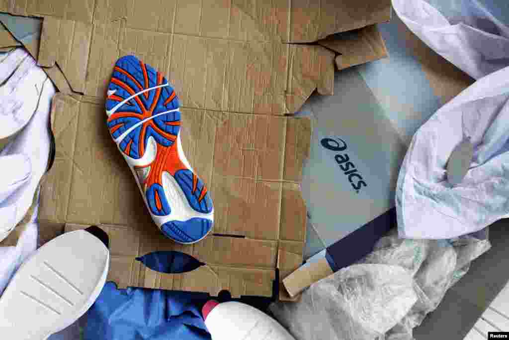 Parts of shoes are seen at the site of the accident in a shoe factory in Phnom Penh, May 16, 2013.