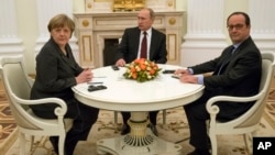 Nemačka kancelarka Angela Merkel, ruski predsednik Vladimir Putin i francuski predsednik Fransoa Oland pred samit o Ukrajini.