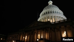 FILE - The U.S. Capitol building in Washington is seen at night, Jan. 28, 2014.