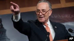 Senate Minority Leader Chuck Schumer, D-N.Y., explains to reporters how his negotiations with President Donald Trump broke down Jan. 19 as quarreling politicians in Washington eventually failed to keep the government in business.