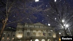 A Dec. 7, 212 file photo shows La Scala opera house during snowfall in Milan, Italy.