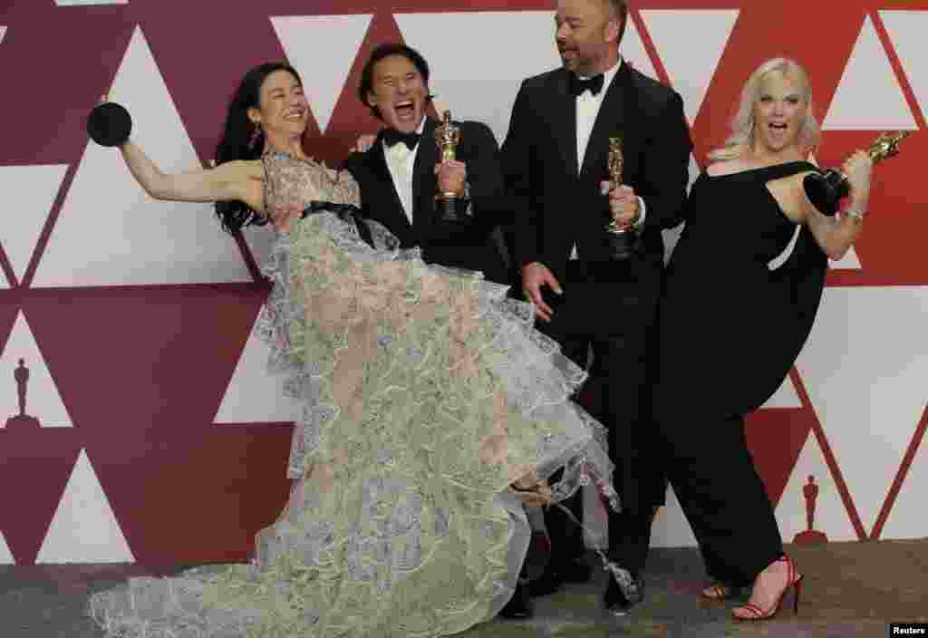 91st Academy Awards - Oscars Photo Room - Hollywood, Los Angeles, California, U.S., February 24, 2019. Elizabeth Chai Vasarhelyi, Jimmy Chin, Evan Hayes and Shannon Dill pose backstage with their statuettes after winning the Best Documentary Feature awar