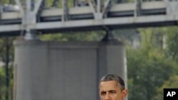 President Barack Obama delivers a speech promoting his jobs bill near the Brent Spence Bridge in Cincinnati, Ohio, Sept. 22, 2011