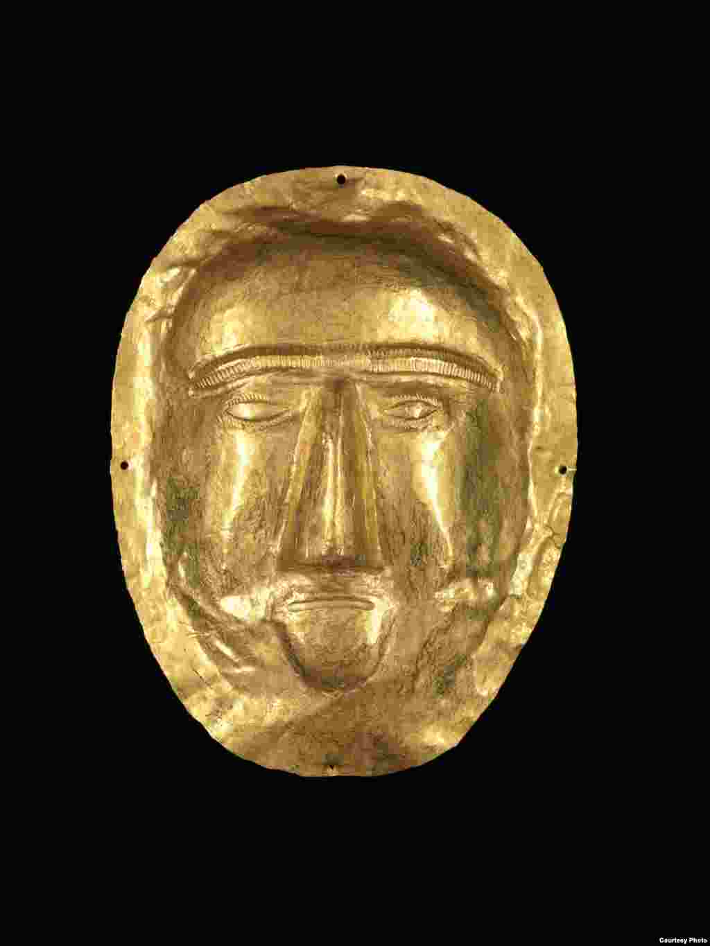 Discovered in a magnificent royal tomb in 1998, this funerary mask from the First Century CE, belonged to a young girl, whose body was covered with gold, rubies, and pearls. (Freer Sackler Galleries/Smithsonian Museum) 