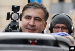 FILE - Mikheil Saakashvili, former president of Georgia and an opposition figure in Ukraine, arrives for a news conference in Warsaw, Poland, Feb. 13, 2018, after being deported from Ukraine.