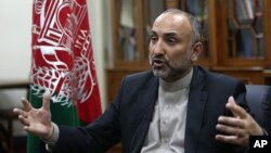 FILE - Afghan National Security Adviser Hanif Atmar speaks during an interview in Kabul, Afghanistan, Oct. 24, 2015. Atmar claims Islamic State fighters detained in Afghanistan had documents showing Pakistani citizenship.