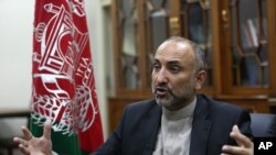 FILE - Then-Afghan National Security Adviser Mohammad Hanif Atmar speaks during an interview in Kabul, Oct. 24, 2015.