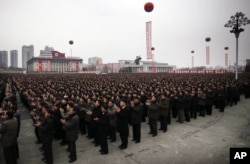 North Koreans gather at the Kim Il Sung Square to celebrate a satellite launch, Feb. 8, 2016, in Pyongyang, North Korea.