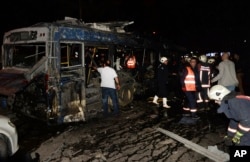 Members of emergency services work at the scene of an explosion in Ankara, Turkey, March 13, 2016.