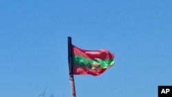 Bandeira da UNITA içada no Cachiungo, província do Huambo