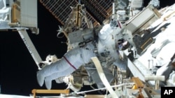 During the second spacewalk of the STS-131 mission, NASA astronauts Rick Mastracchio and Clayton Anderson (out of frame) unhooked and removed the depleted ammonia tank and installed a 1,700-pound replacement on the station’s Starboard 1 truss (file photo)