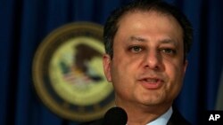 FILE - Preet Bharara, U.S. Attorney for the Southern District of New York, addresses a news conference, in New York, May 28, 2013.