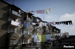 FILE - Laundry is seen hung out to dry in Nagorno-Karabakh's main city of Stepanakert, April 8, 2016.