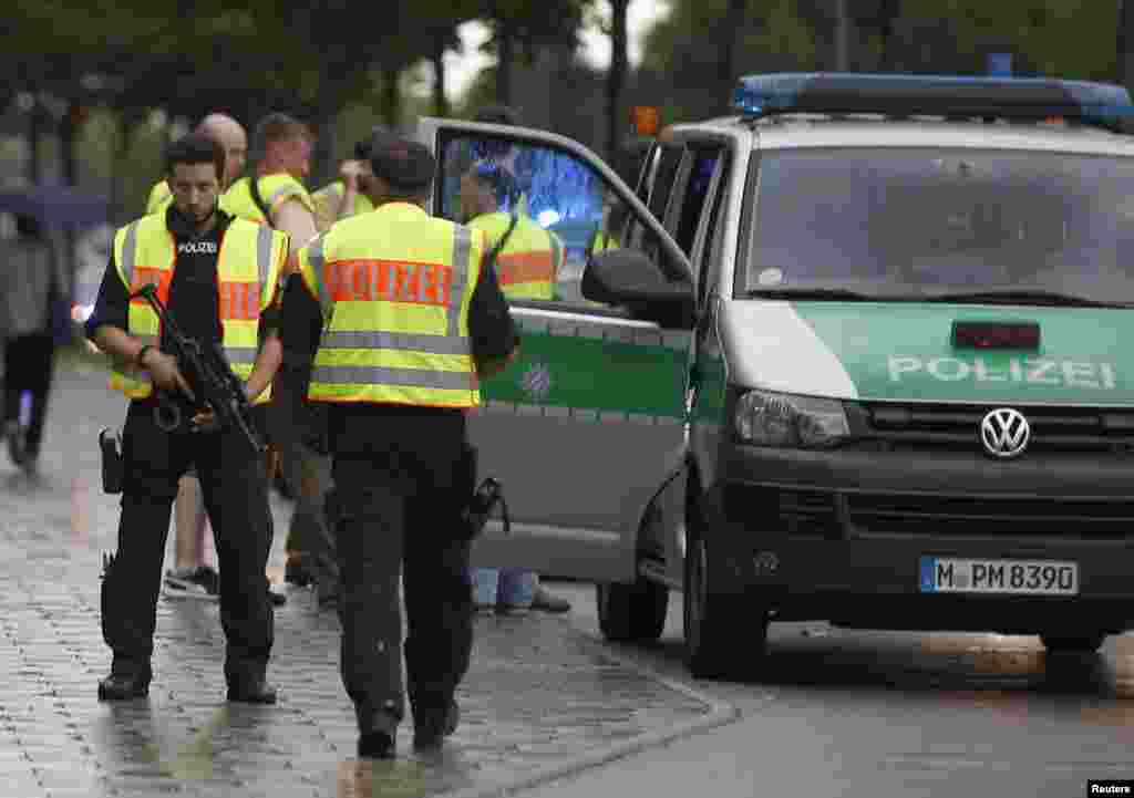 Police secure a street near the scene of a shooting in Munich, Germany July 22, 2016.