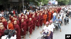 FILE - Burma Buddhist monks stage a rally to protest against ethnic minority Rohingya Muslims after sectarian violence erupted between ethnic Buddhists and Rohingya Muslims in this 2012 photo.