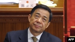 In a file picture taken on March 5, 2012, Chongqing mayor Bo Xilai attends the opening session of the National People's Congress at the Great Hall of the People in Beijing.