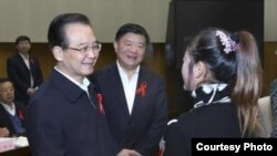 被刑拘的陈淑霞女士2011年曾获时任总理温家宝接见。（爱知行万延海微博）