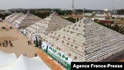 This aerial view shows bags of rice at the launch of the largest rice pyramids in Abuja, Nigeria, on Jan. 18, 2022. 