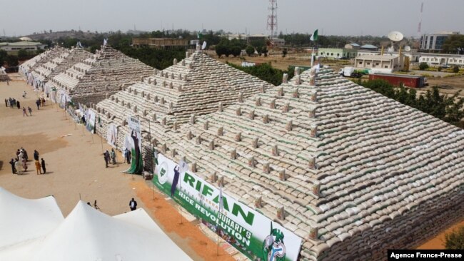 This aerial view shows bags of rice at the launch of the largest rice pyramids in Abuja, Nigeria, on Jan. 18, 2022.