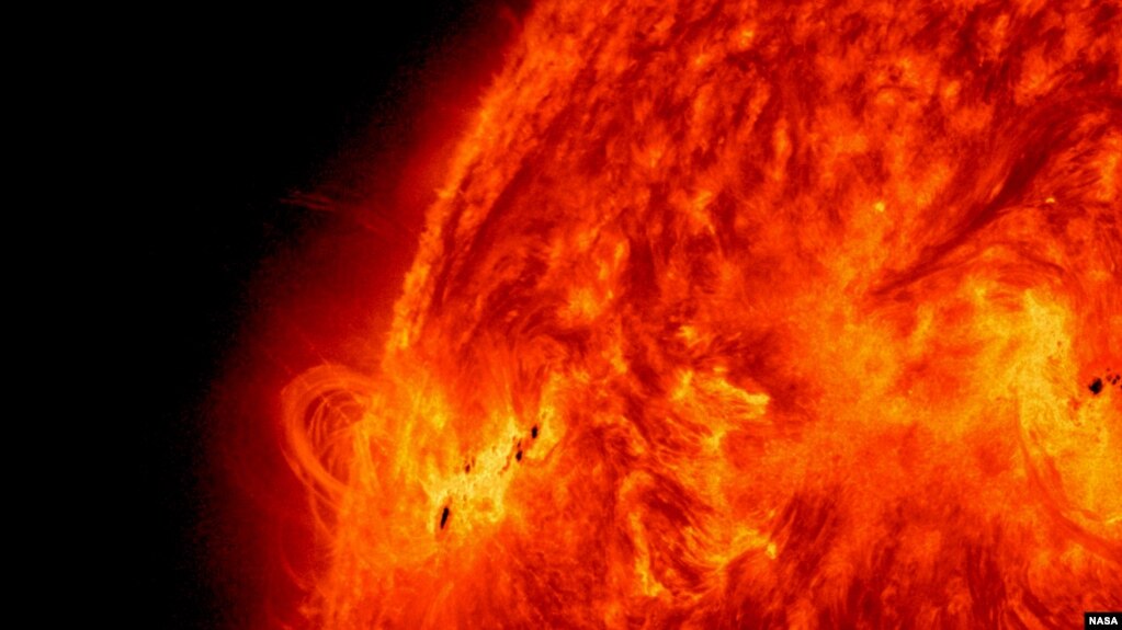 FILE - The sun is seen releasing a solar flare on May 14, 2013. (Credit: NASA/SDO)