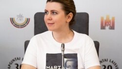 Dovile Sakaliene, co-chair of the delegation of Lithuanian lawmakers at IPAC, seen wearing a T-shirt in support of Maria Kalesnikava, political prisoner in Belarus. (Dovile Sakaliene/Twitter)