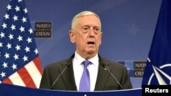 FILE - U.S. Secretary of Defense Jim Mattis speaks at a news conference after a NATO defense ministers meeting at the Alliance headquarters in Brussels, Belgium, June 29, 2017. 