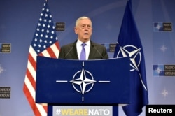 FILE - U.S. Secretary of Defense Jim Mattis gives a news conference after a NATO defense ministers meeting at the Alliance headquarters in Brussels, Belgium, June 29, 2017.