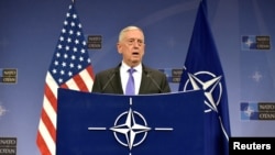 FILE - U.S. Secretary of Defense Jim Mattis gives a news conference after a NATO defense ministers meeting at the Alliance headquarters in Brussels, Belgium, June 29, 2017. 