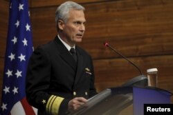 FILE - Vice Admiral James Syring, director of the U.S. Missile Defense Agency, delivers a speech in Bucharest, Romania, Dec. 18, 2015.