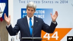 Secretary of State John Kerry addresses the Council of the Americas' 44th Conference of the Americas at the State Department in Washington, Wednesday, May 7, 2014. (AP Photo/Cliff Owen)