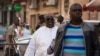 Papa Massata Diack, au centre, fils de l'ancien président de l'IAAF Lamine Diack arrive au commissariat central de Dakar, au Sénégal, lundi 17 février 2016. 