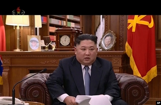 FILE - In this undated image from video distributed Jan. 1, 2019, by North Korean broadcaster KRT, leader Kim Jong Un delivers a speech in North Korea.