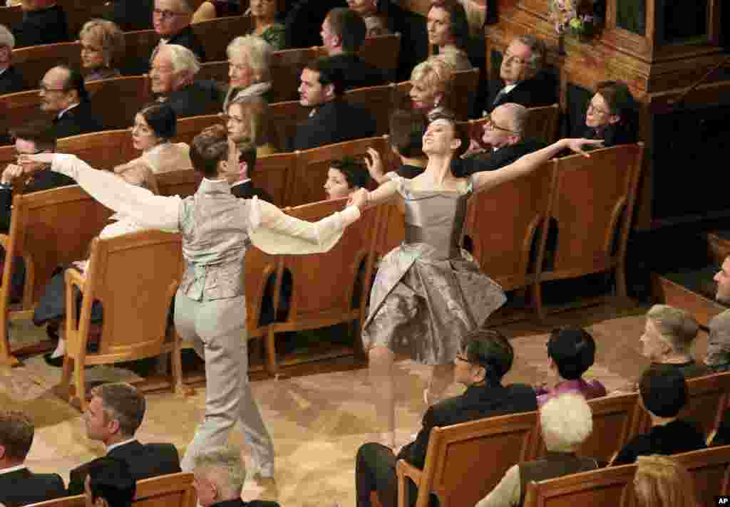 Young ballet dancers perform during the traditional New Year&rsquo;s Concert of the Vienna Philharmonic Orchestra at the Golden Hall of the Musikverein in Vienna, Austria.