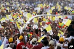 Pope Francis arrives to celebrate Mass in the Kyaikkasan Ground in Yangon, Myanmar, Wednesday, Nov. 29, 2017.