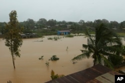 An aerial view of houses submerged in water in Pemba city on the northeastern coast of Mozambique, April 30, 2019.