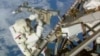US Astronauts Rig 'Parking Spots' To Space Station