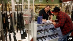 FILE - Guns were a very popular item this Black Friday, according to FBI statistics.