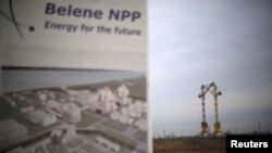 FILE - Cranes are seen in the background at the construction site of Bulgaria's second nuclear power plant in Belene, some 230 km (143 miles) north of Sofia, Jan. 24, 2013.