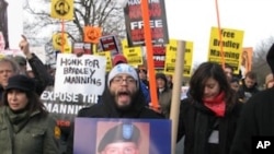 Protesters marched along the Fort Meade compound showing support for Bradley Manning in Fort Meade, Maryland, December 17, 2011.