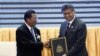 Cambodia Prime Minister Hun Sen, left, with ASEAN Secretary-General Surin Pitsuwan after adoption of the regional bloc's Human Rights Declaration, Phnom Penh, Nov. 18, 2012.