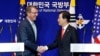 韩国防长吁按照国际准则解决南中国海纠纷
