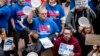 Furloughed government workers affected by the shutdown hold a silent protest against the ongoing partial government shutdown on Capitol Hill in Washington, Jan. 23, 2019. 