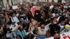 مقامات امریکایی به معترضان: آزمایش کووید۱۹ کنید 