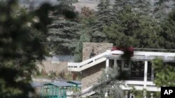 Hotel Spozhmai di tepi Danau Qurgha di luar ibukota Kabul, Afghanistan yang diserbu oleh militan Taliban (22/6).