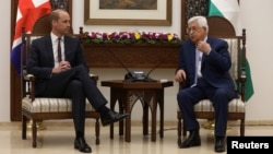 Palestinian President Mahmoud Abbas gestures during his meeting with Britain's Prince William in Ramallah, in the occupied West Bank, June 27, 2018.