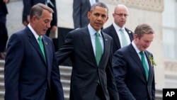 FILE - From left, House Speaker John Boehner of Ohio, President Barack Obama and Irish Prime Minister Enda Kenny leave a "Friends of Ireland" luncheon on Capitol Hill in Washington, March 17, 2015.